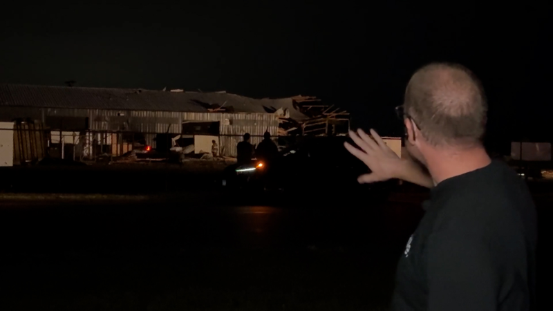 On the scene of damage after a tornado in Illinois