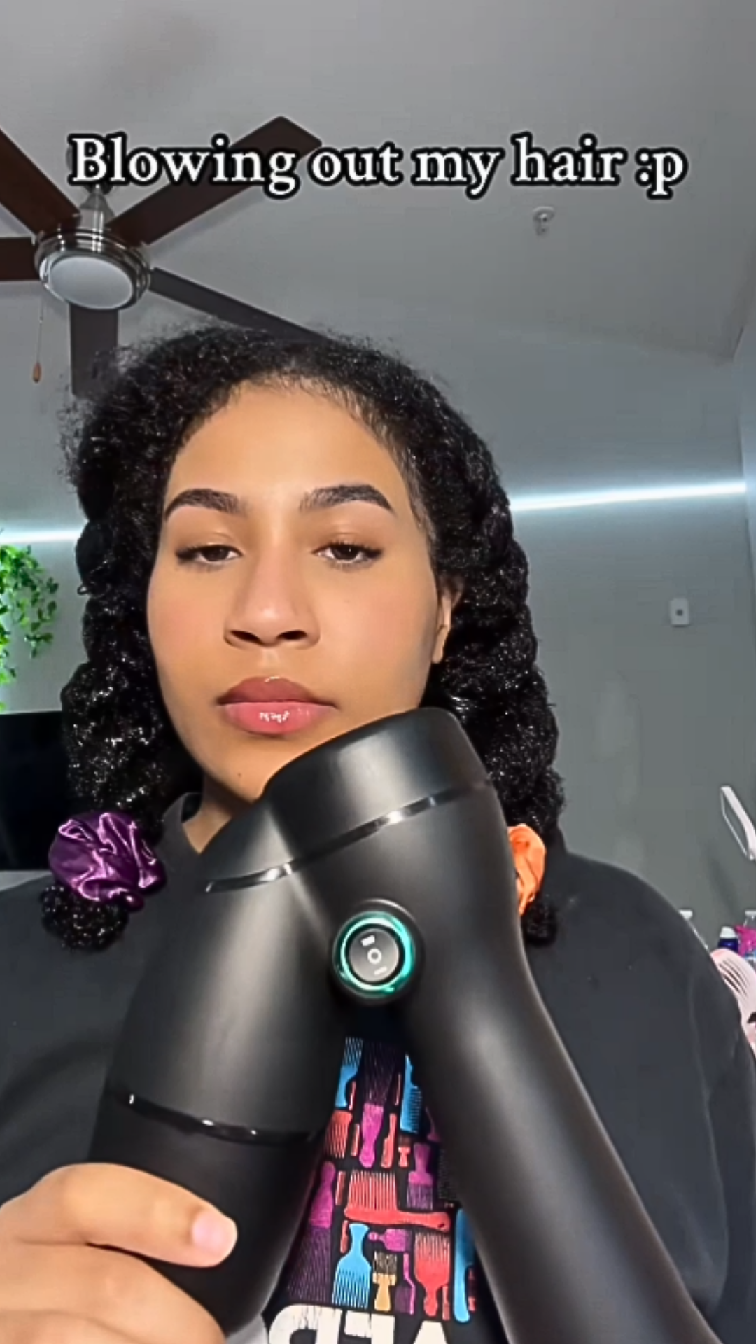 Smooth curly hair blowout routine
