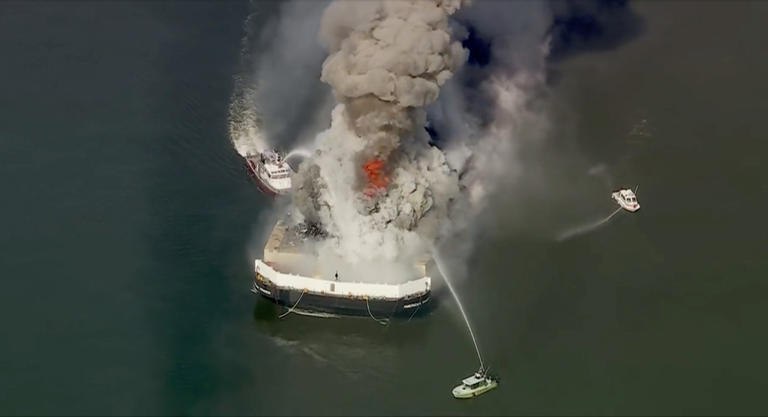 Massive fire breaks out aboard scrap metal barge on Delaware Bay