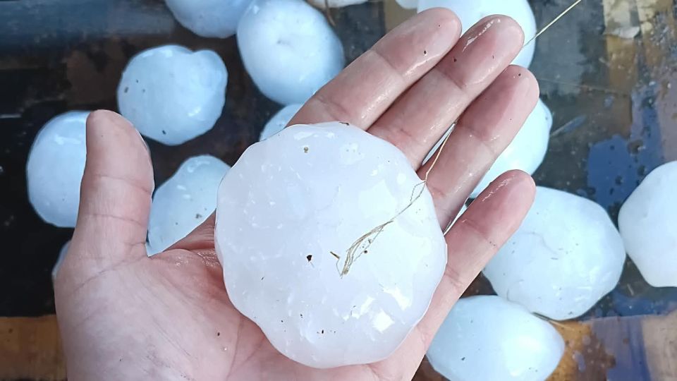 Dangerous storms tear through central US with tornadoes and huge hail