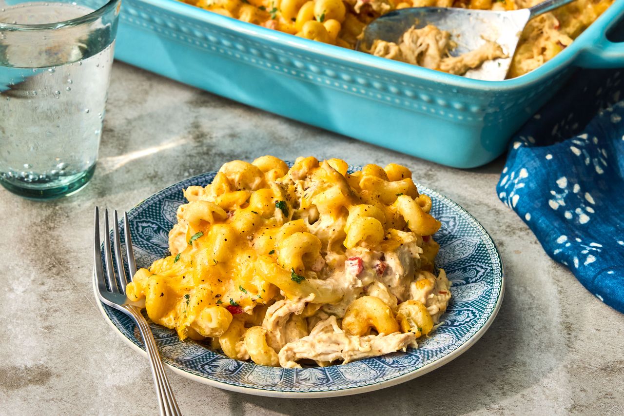 Disappearing Chicken Casserole on a plate to serve with the baking dish in the background
