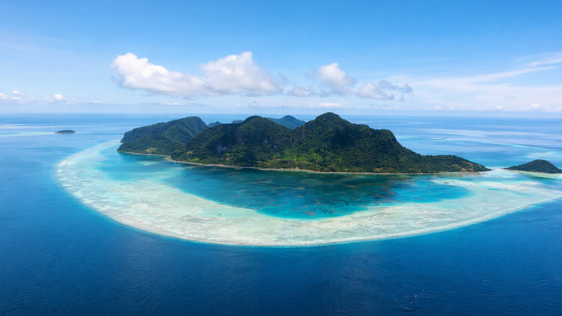 An island sealed by its own reef