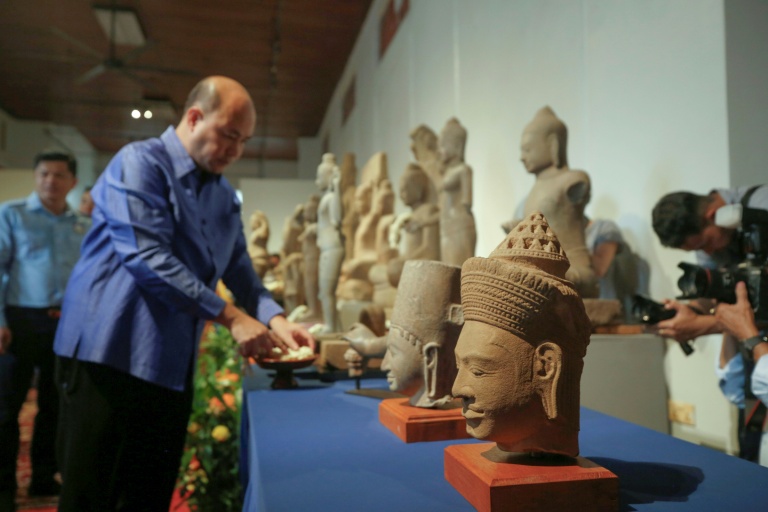 Cambodia welcomes back dozens of artefacts looted by UK trafficker<br>