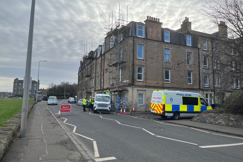 Edinburgh police close road as car ploughs into scaffolding and driver ...