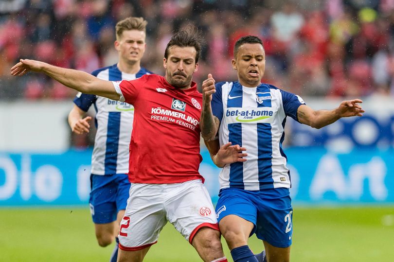 Allan (right) spent time on loan in Europe during his five-year spell at Liverpool