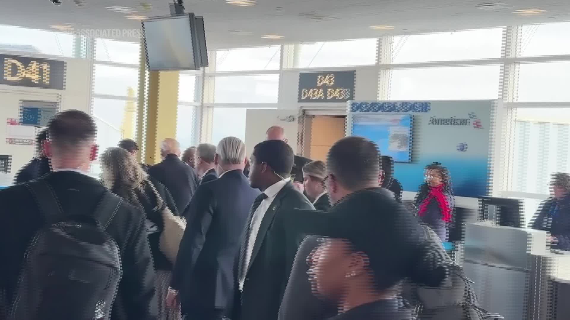 Joe Biden flies commercial (AP video)