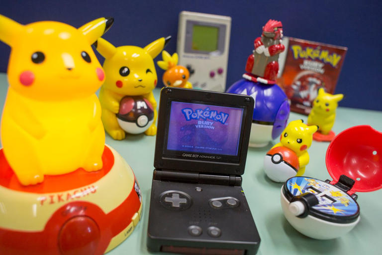 Pokémon Ruby on Game Boy SP with an original Game Boy in the background Credit: May Tse/South China Morning Post/Getty