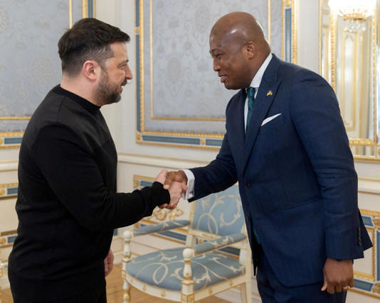 Volodymyr Zelenskyy welcoming Samuel Okudzeto Ablakwa before a meeting. Photograph: Ukrainian Presidential Press Service/Reuters