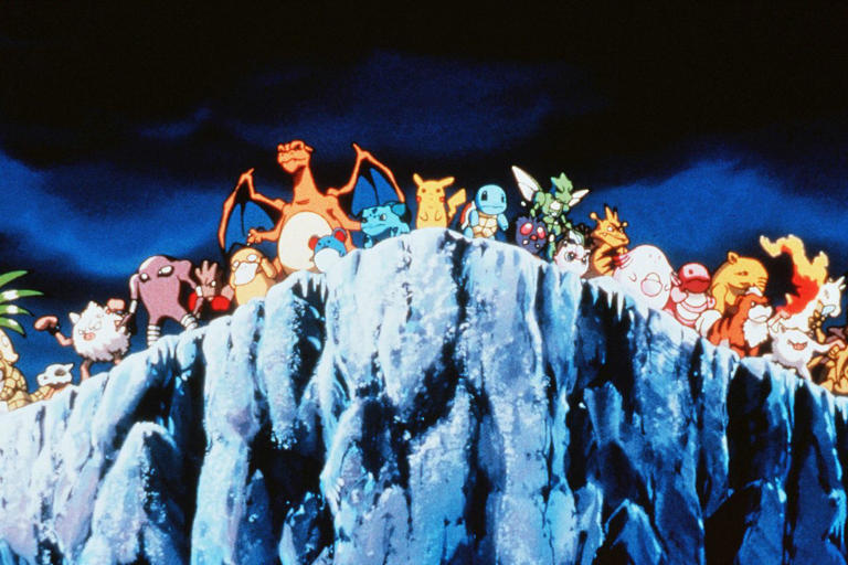 A large group of Pokémon stands on a cliff's edge Credit: Shogakukan/Tomy/Kobal/Shutterstock
