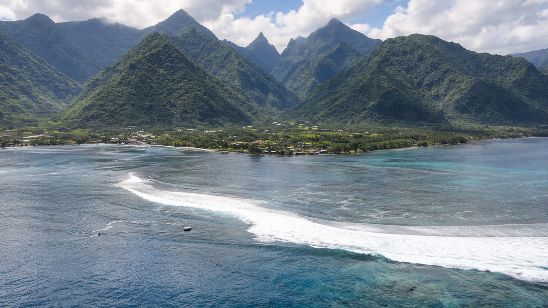 An island trapped between peaks and waves