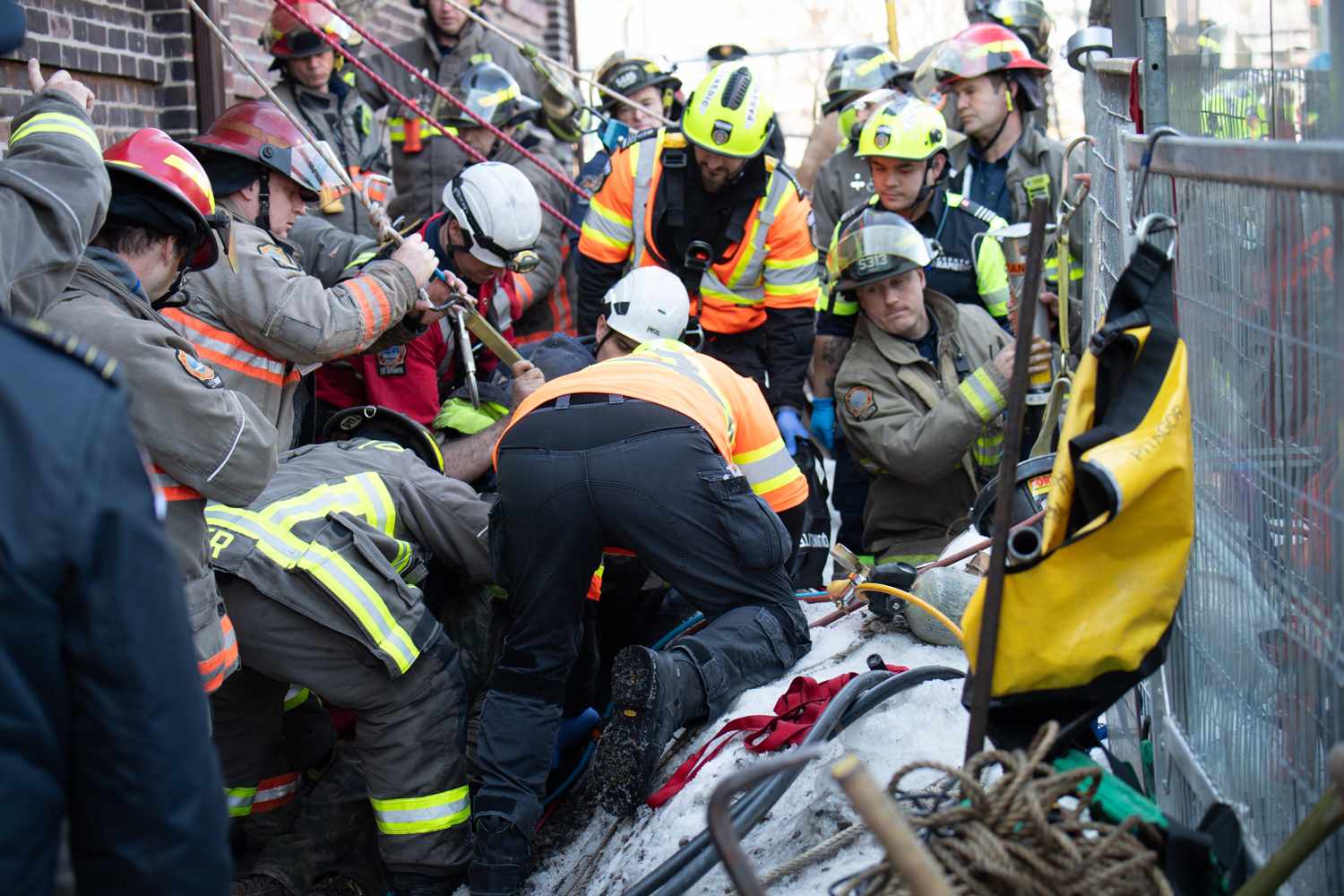 Construction worker rescued after being stuck in excavation hole for ...