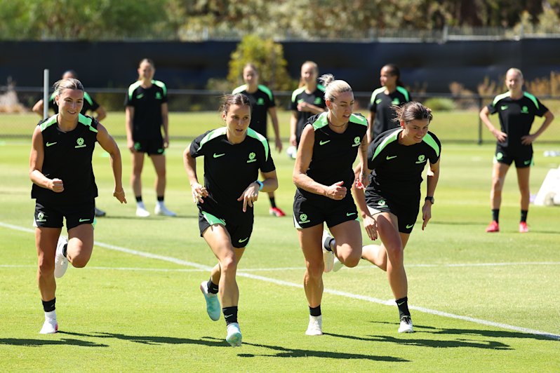 The Matildas warm up during training in Perth on Saturday.