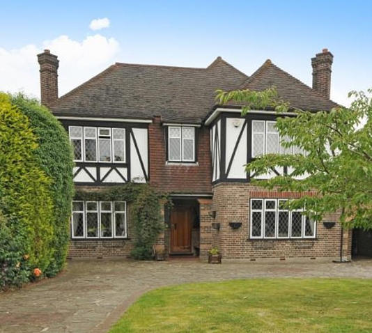 Former HSBC executive Joseph Molloy was spared jail but banned from travelling on his local rail network after dodging train fares totalling £5,900. The married father bought a sprawling four-bedroom mock Tudor home (pictured) for almost £1.2million more than 10 years ago