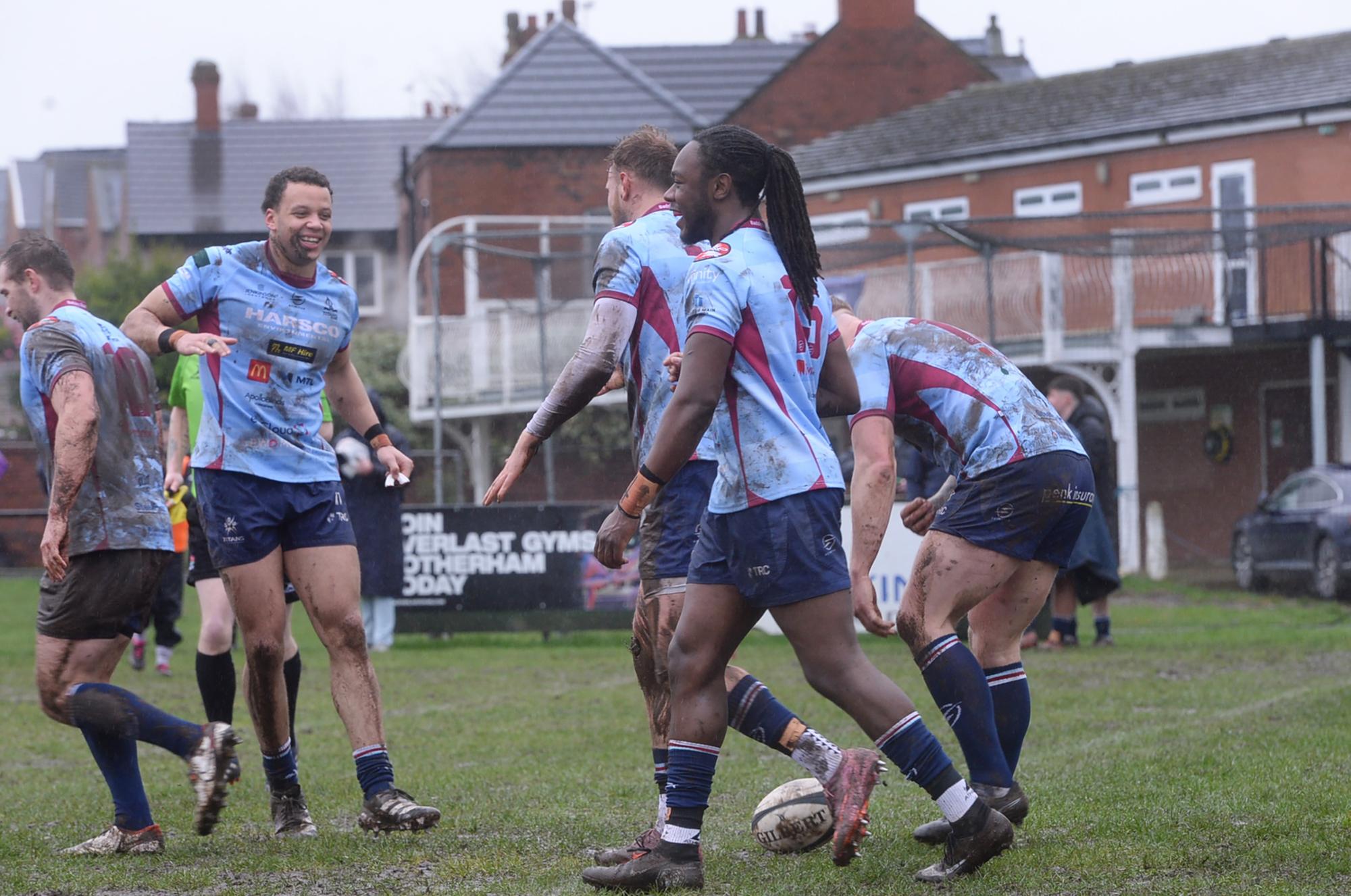 Table-topping Rotherham Titans prevail in the mud as nearest rivals slip up