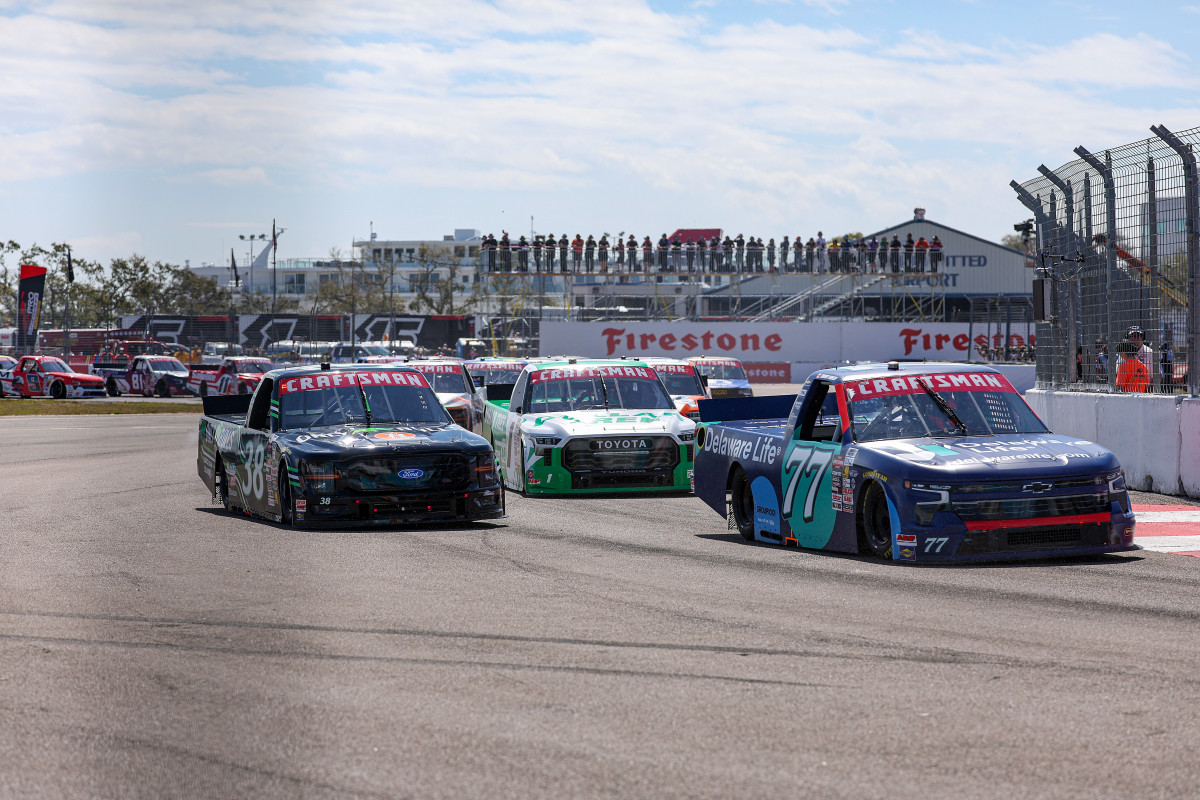 Dario Franchitti hits James Hinchcliffe while passing at St. Pete Truck ...