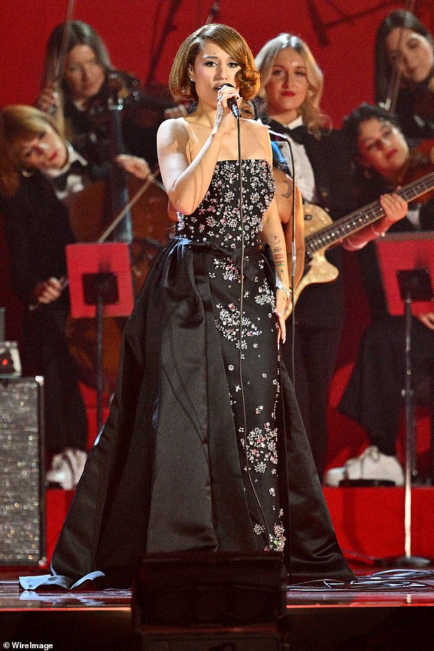 Raye commands BRITs stage in emotional show-stopping performance as ...