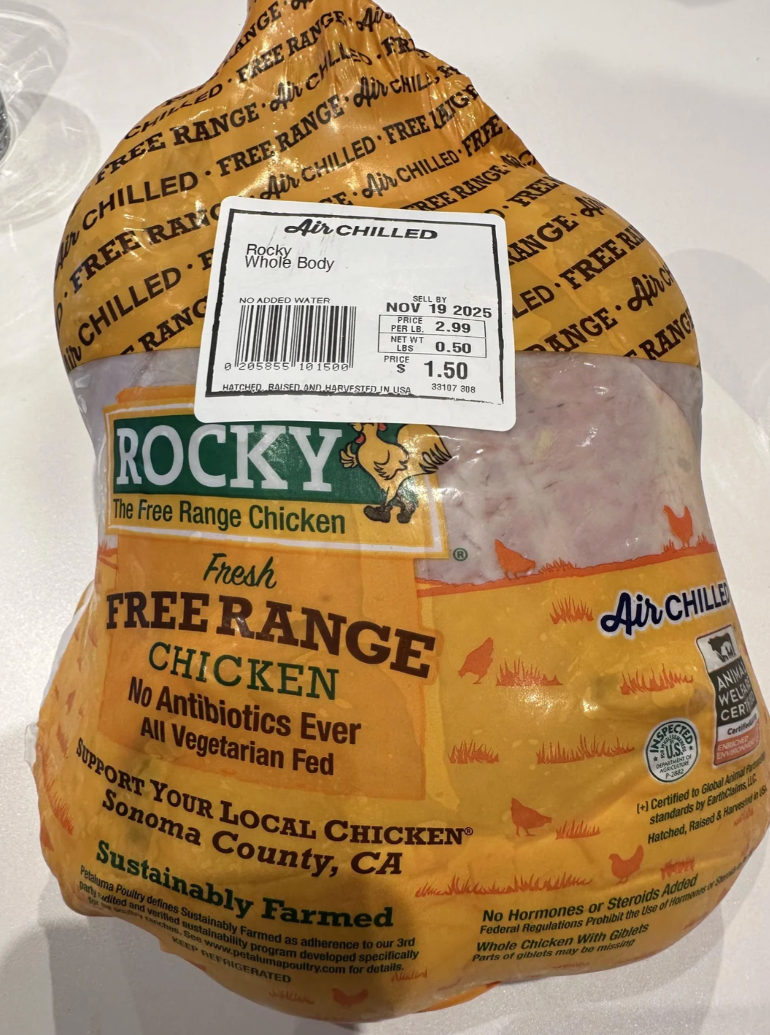 Computer screen showing a Reddit post with a mislabeled price tag on a chicken, humorously shared as a frugal find