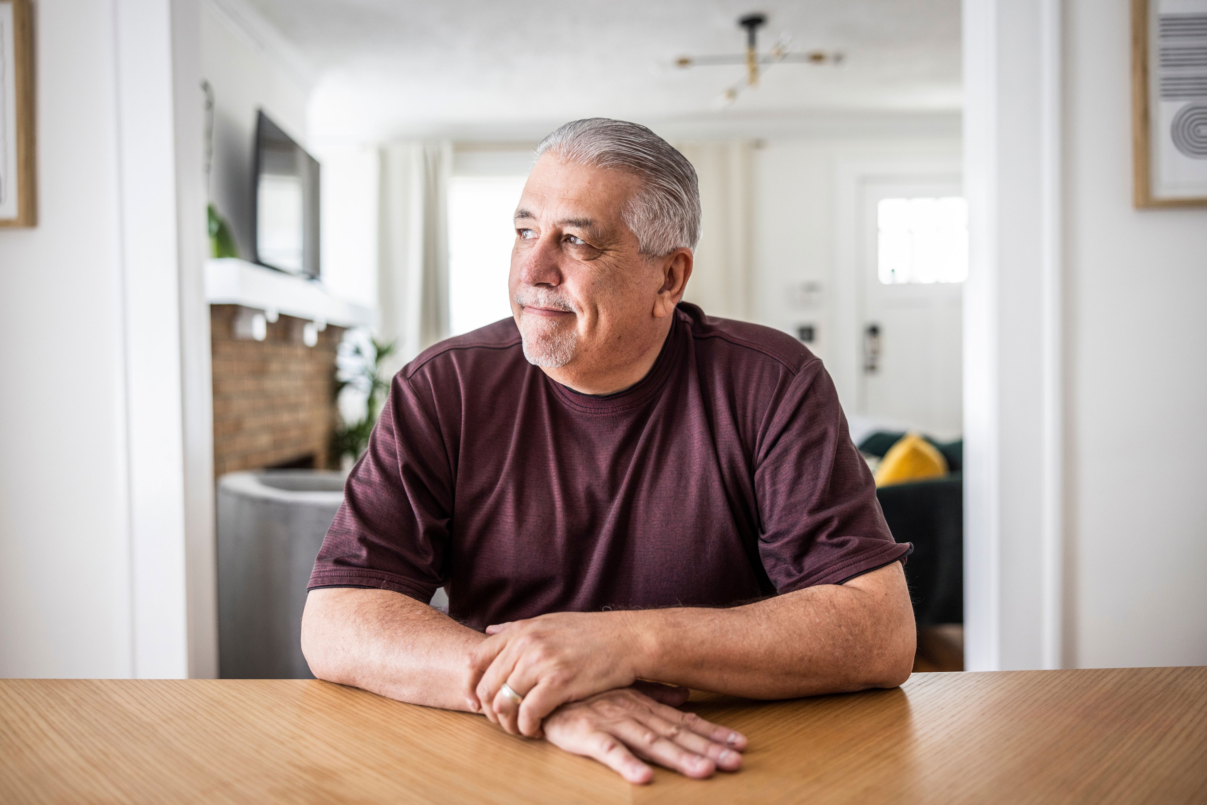 Portrait of senior couple in dining room (Photo: MoMo Productions via Getty Images)