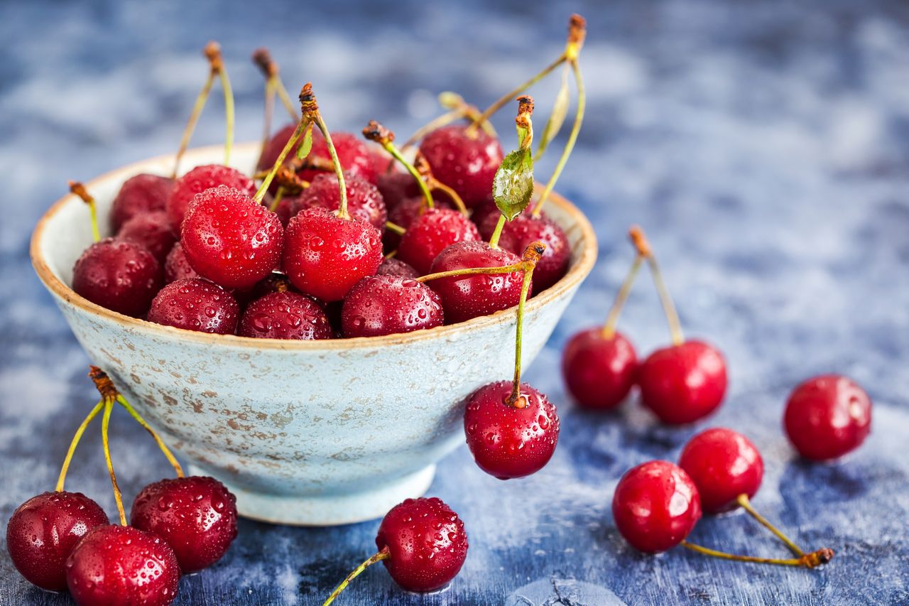 Fresh wet ripe sour cherry in a bowl