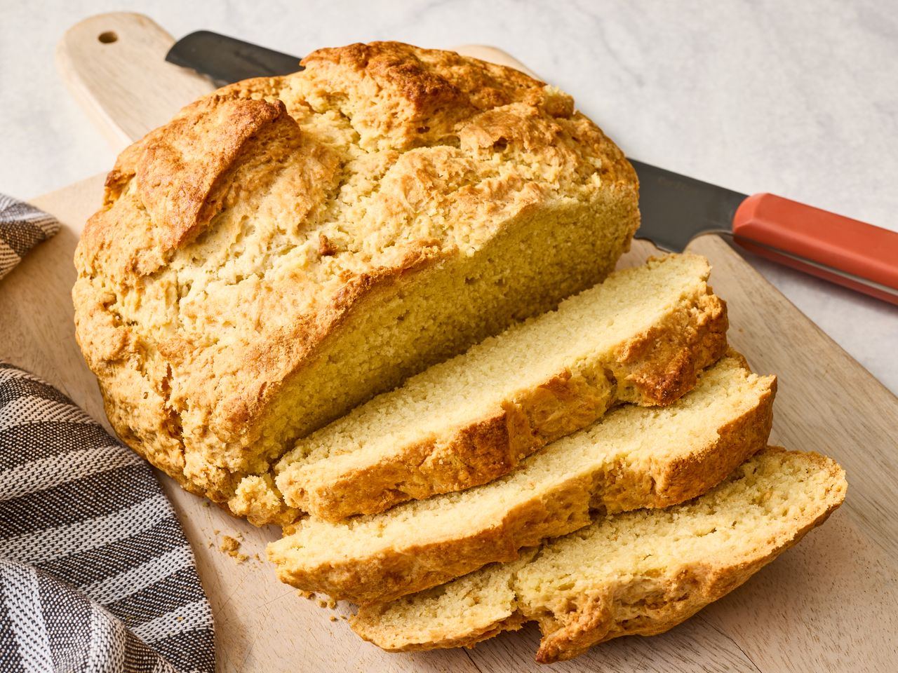 sliced Irish soda bread, resting on a cutting board