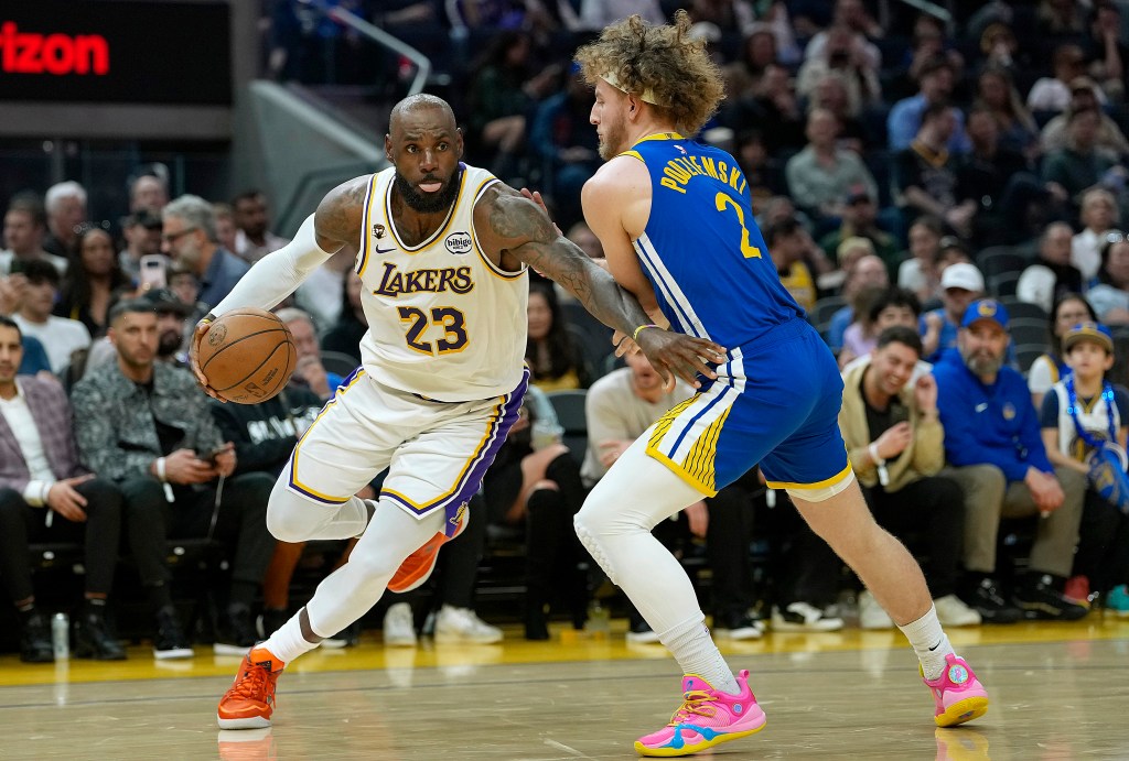 LeBron James matches Kobe Bryant Lakers milestone in win over Warriors