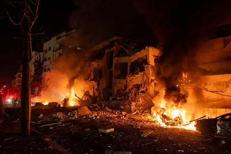 Iranian rockets kill 9 near Jerusalem as pictures show Tel Aviv on fire