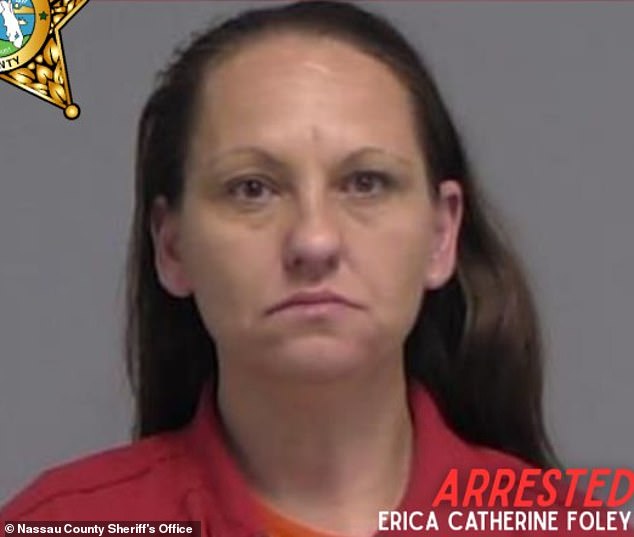 Elderly woman laughs in mugshot after she's accused of giving toddler ...