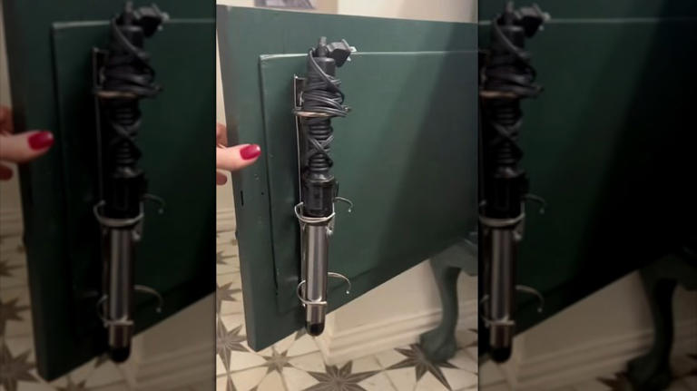 Keep hair appliances organized with the help of old binder rings