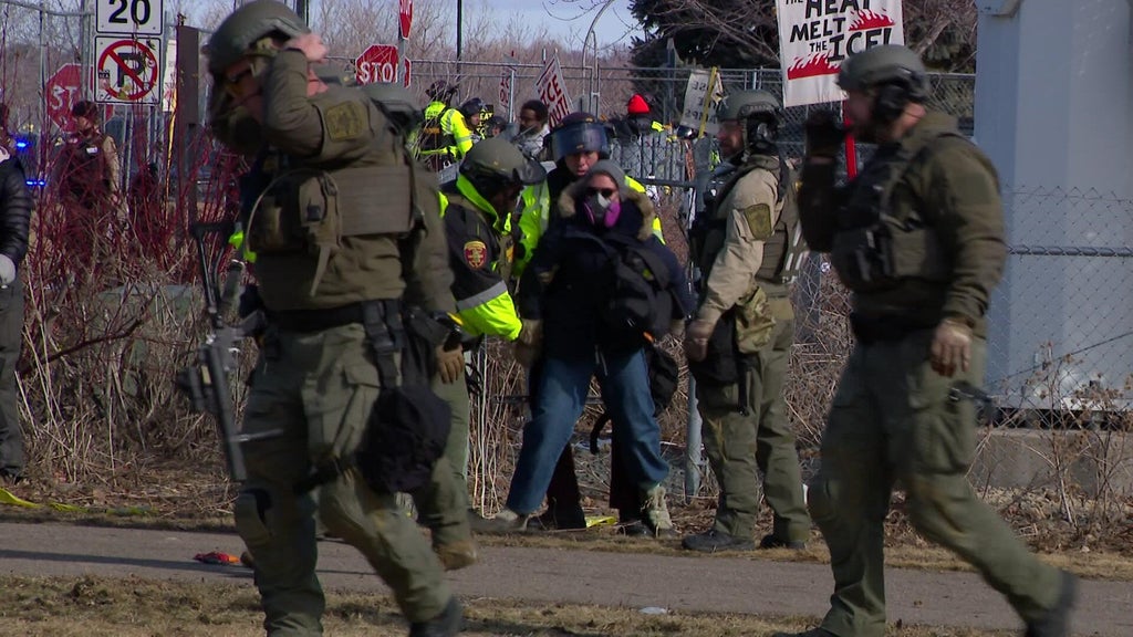Dozens arrested during protest outside Whipple Federal Building after sheriff