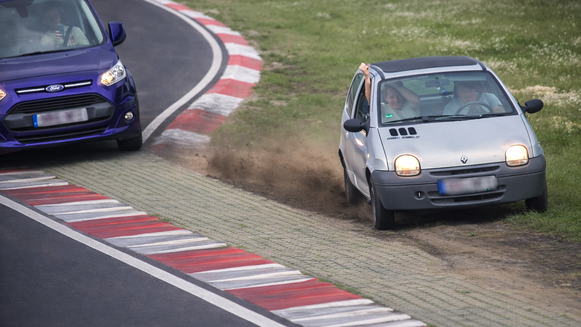Slow cars driving fast at Nürburgring track