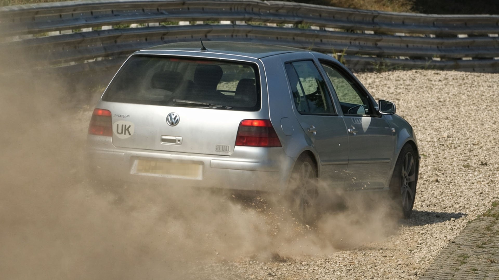 High speed push sends car off line