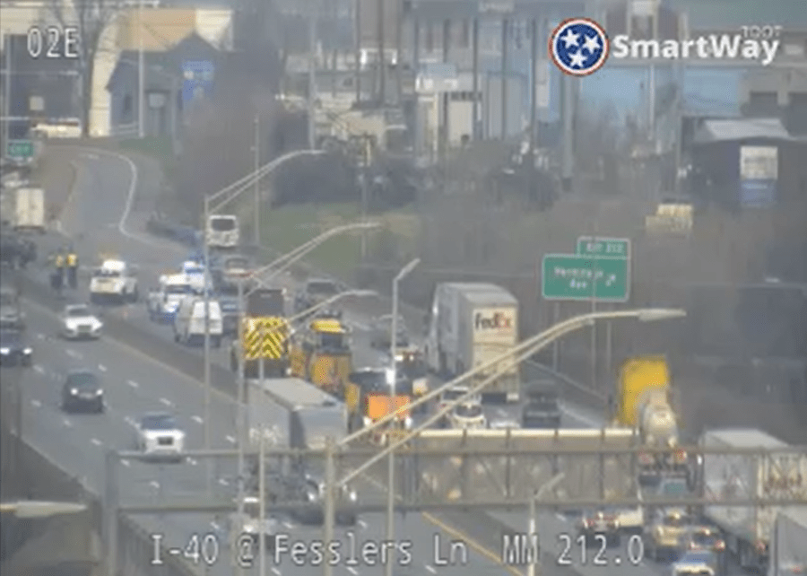 Driver killed while inspecting vehicle after crash on I-40
