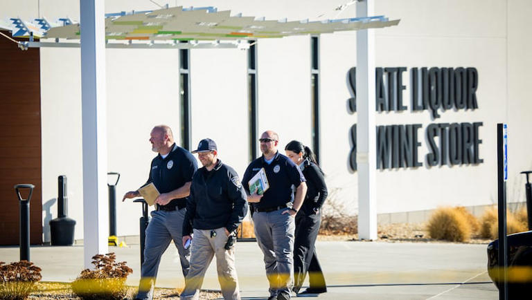 Suspected gunman shot by police at liquor store tied to apparent road ...