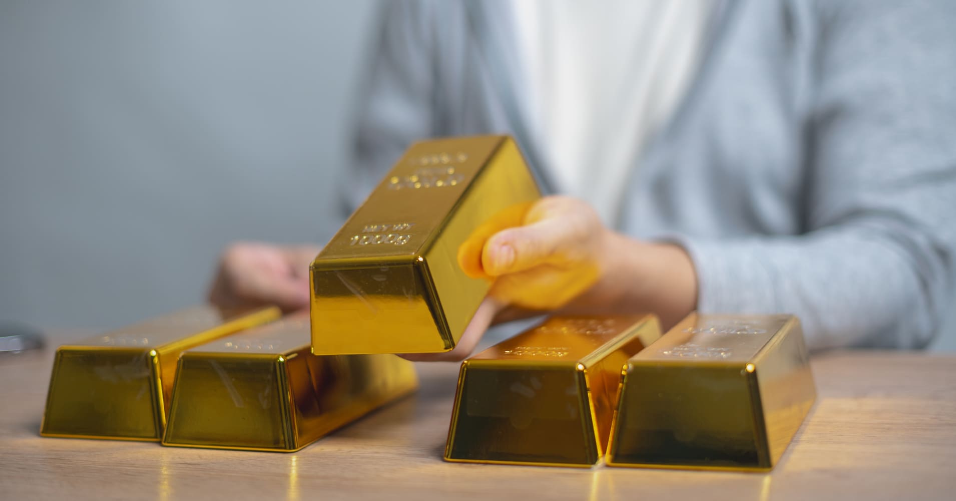 Gold price jumps on Middle East turmoil. What to know before investing