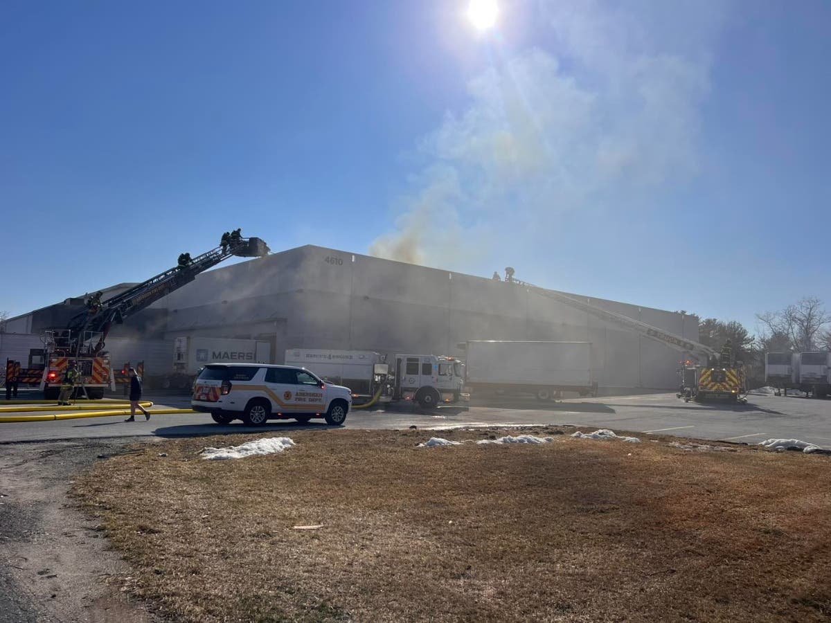 Warehouse fire draws firefighters from half a dozen crews