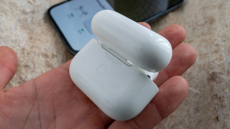 What is the button on the back of your AirPods case for?