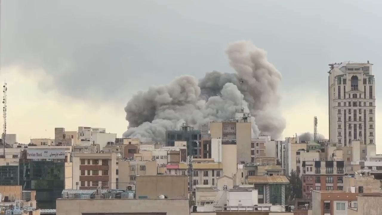 AP video shows smoke rising in Tehran after several US-Israeli strikes ...