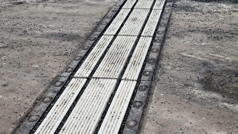 What those gaps along highway bridges are really designed to do