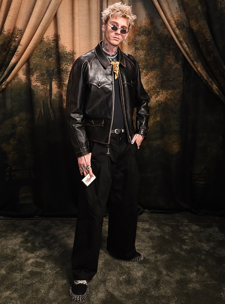 Machine Gun Kelly reacts after fan falls off stage during concert<br>