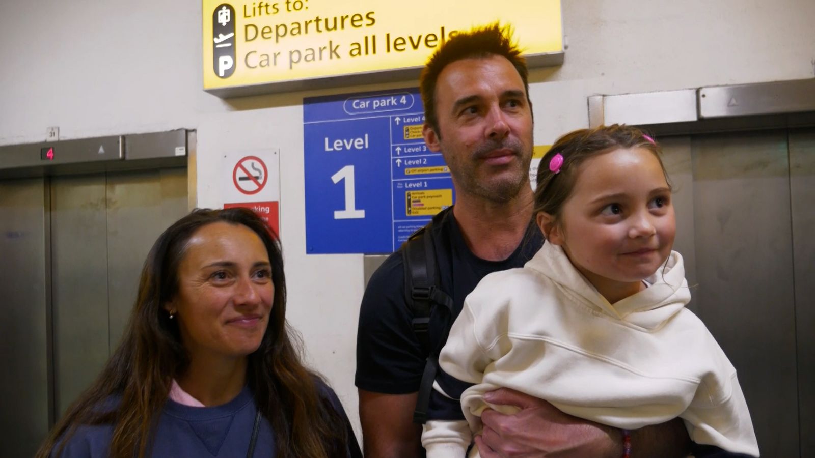 Stranded Britons arrive back in London