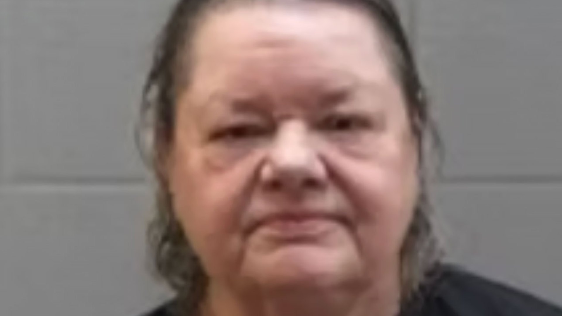 Woman accused of fatally shooting husband in head told 911 he shot her dog