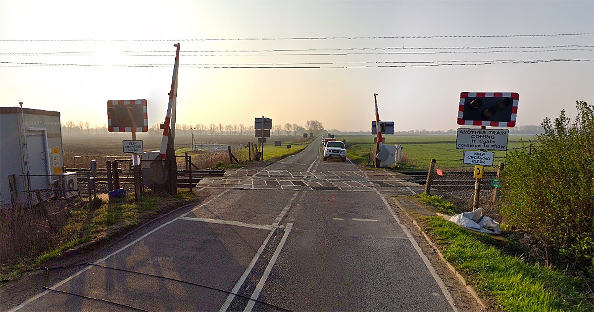 One dead after train and car crash on level crossing in Ely