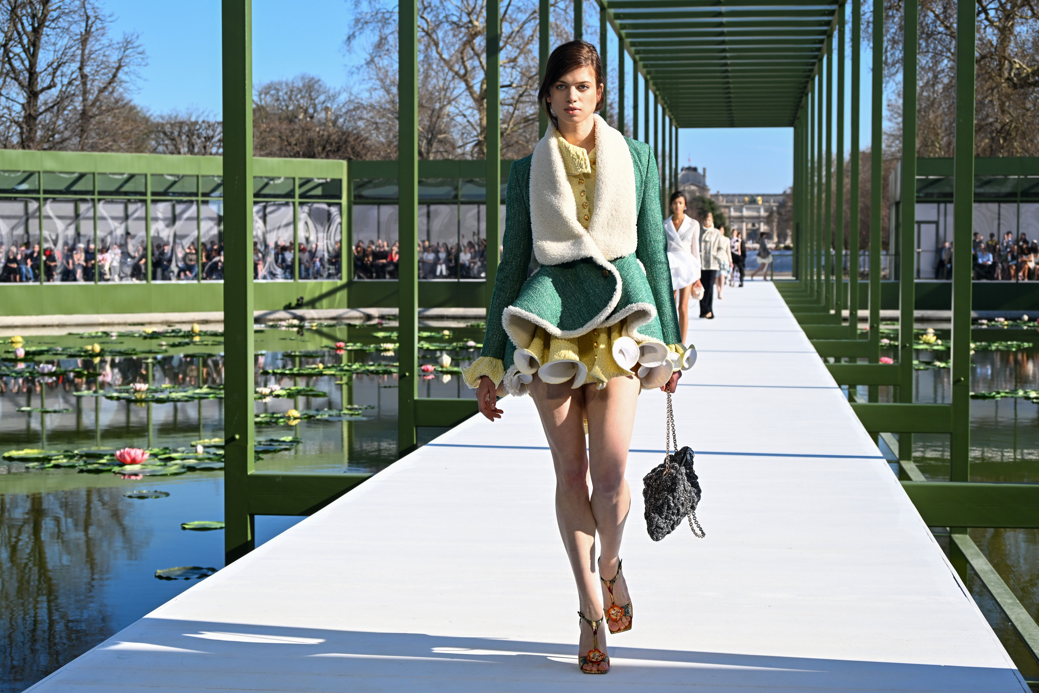 Dior blooms with peplums, bustles and waterlily florals in Paris ...
