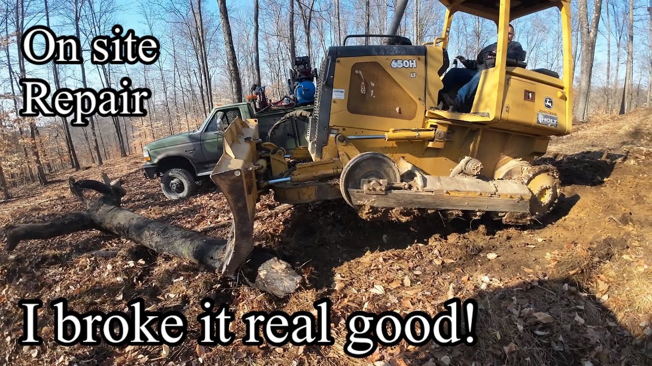 What caused the dozer track to fall off?—on-site field repair of John ...