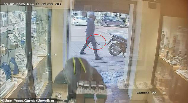 Moment robbers armed with a chainsaw and machete smash into high street ...