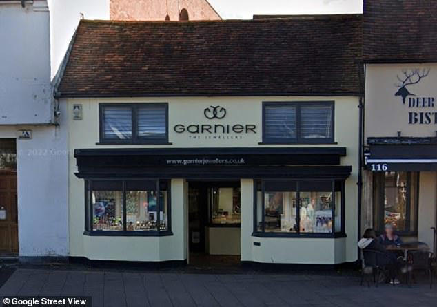 Moment robbers armed with a chainsaw and machete smash into high street ...