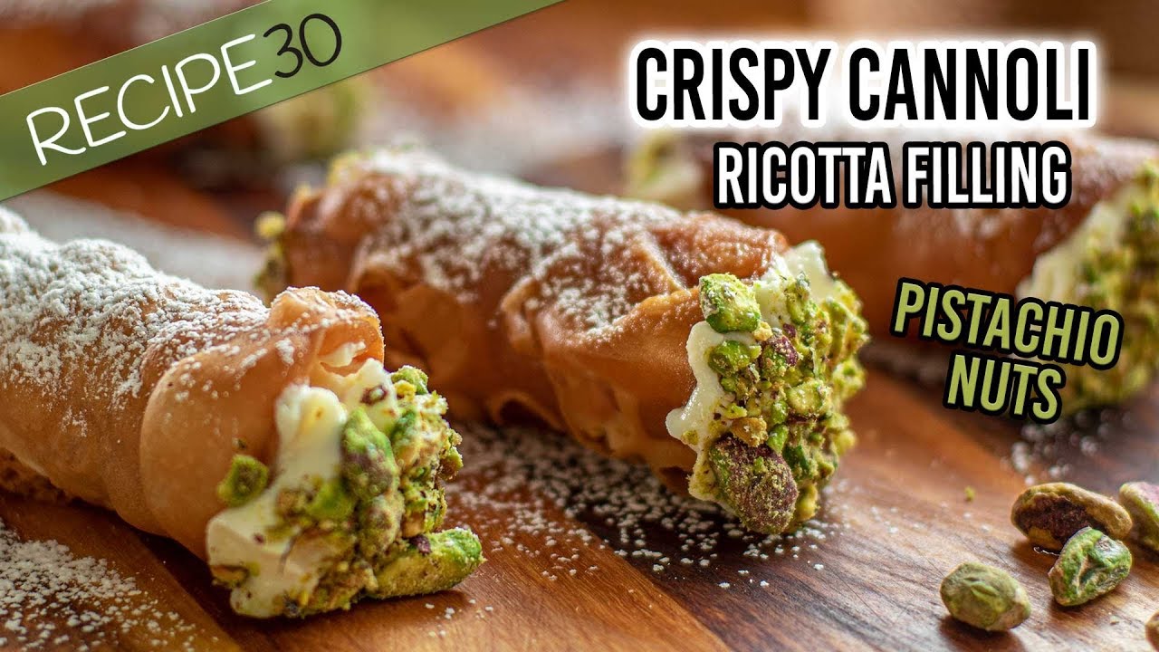 Crispy cannoli with ricotta filling and pistachio nuts