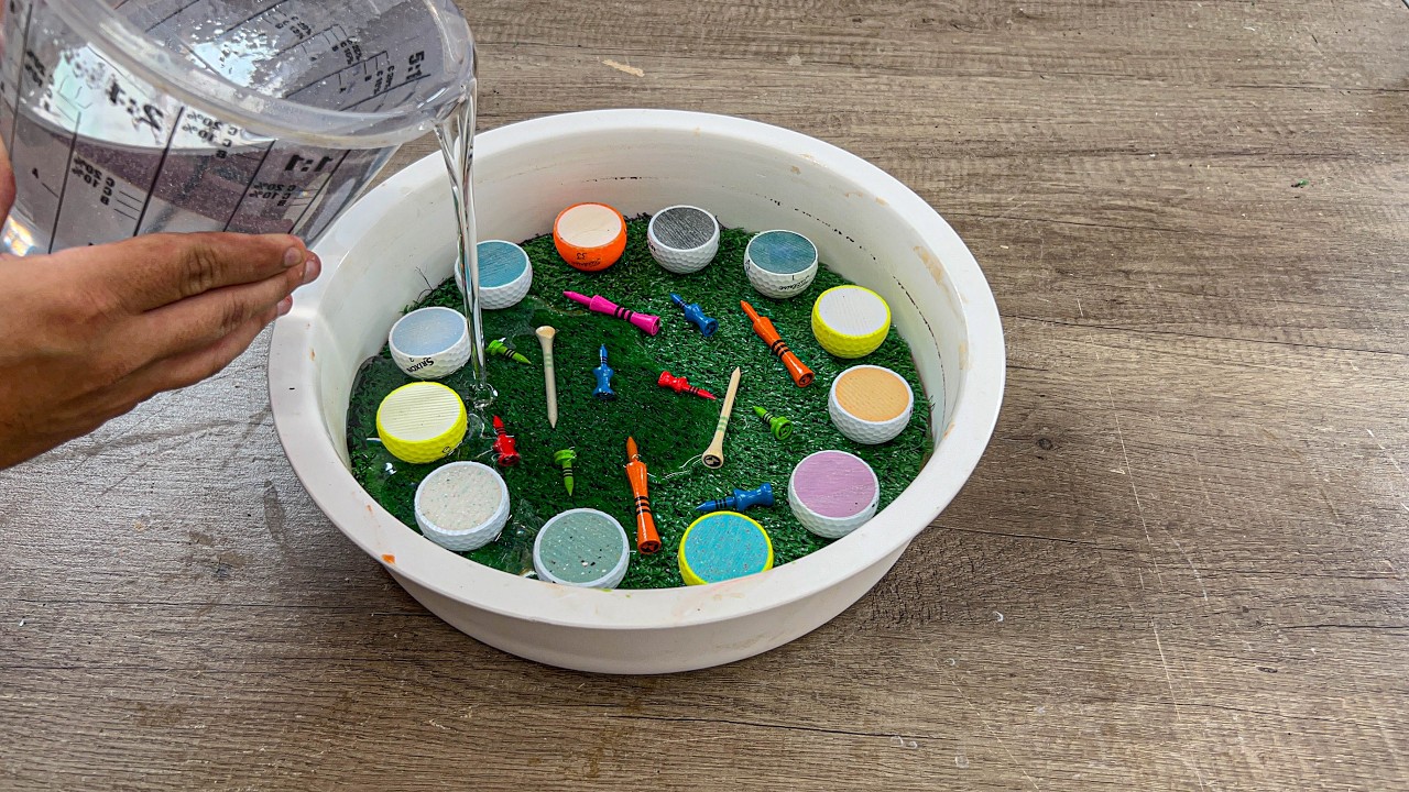 I made a clock out of golf balls and grass!