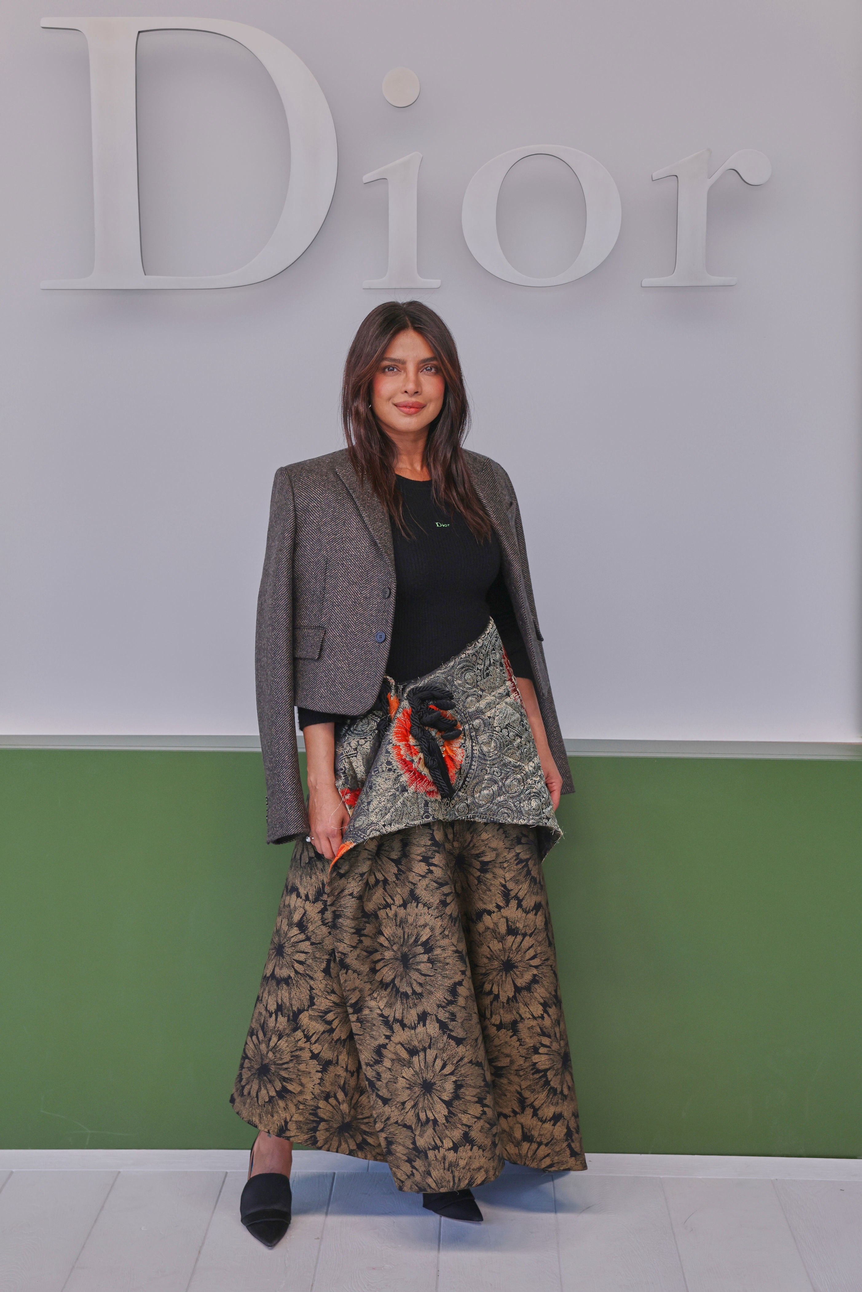 Dior blooms with peplums, bustles and waterlily florals in Paris ...