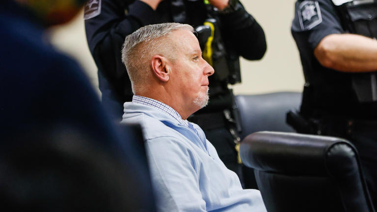 Accused killer's father convicted in school shooting that left four dead